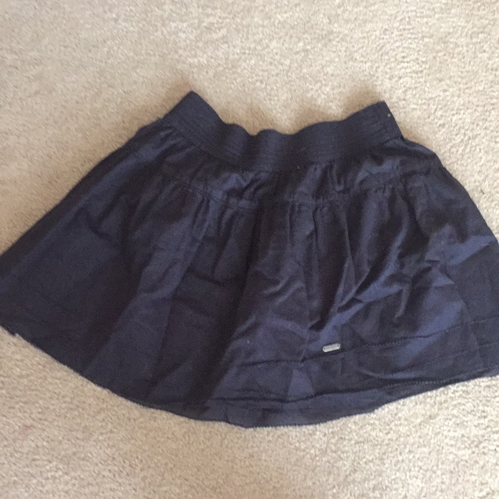 Navy blue women’s skirt.